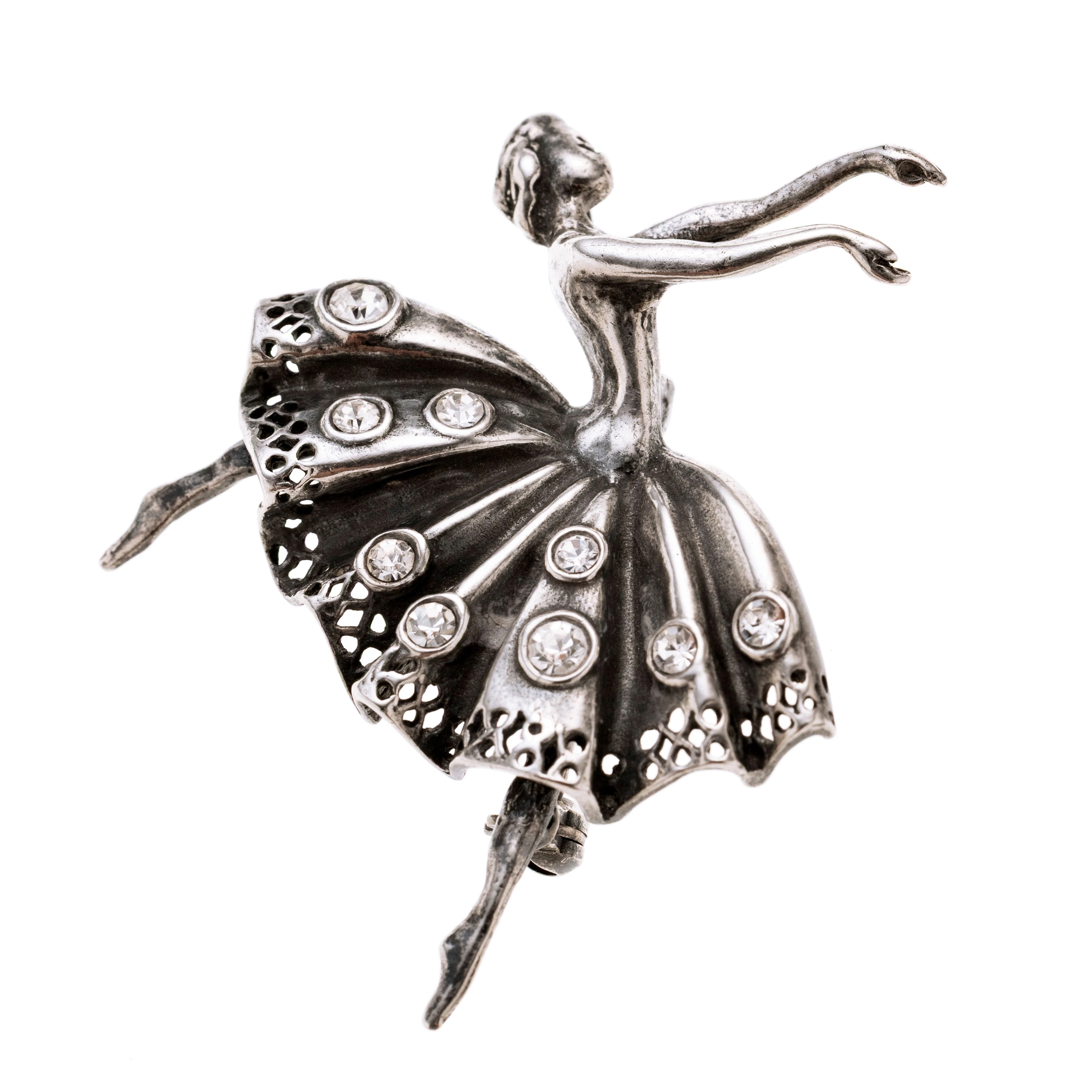 Eine tanzende Ballerina mit neun Glassteinen im Tutu